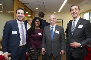 New public relations professional, Mike DeFilippis (far right), poses with (left to right) Robert Schneider, Aarthi Gunasekaran and Robert A. Brown at a Boston University open house event in April. Photo courtesy of Mike Defilippis.
