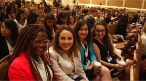 Conference attendees pose for a photo amidst a day of sessions and networking. | Courtesy of PRSSA National.