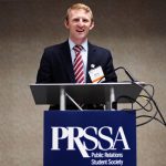 Andrew Cook behind a PRSSA podium